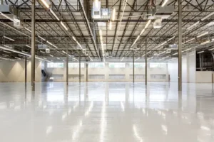 Seamless epoxy resin flooring with high-gloss finish transforming a modern garage interior