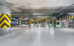 Smooth grey epoxy garage floor coating in a modern UK home garage