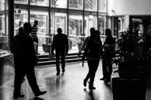 Business professionals silhouette representing anonymous partnership behind GL Homes real estate success